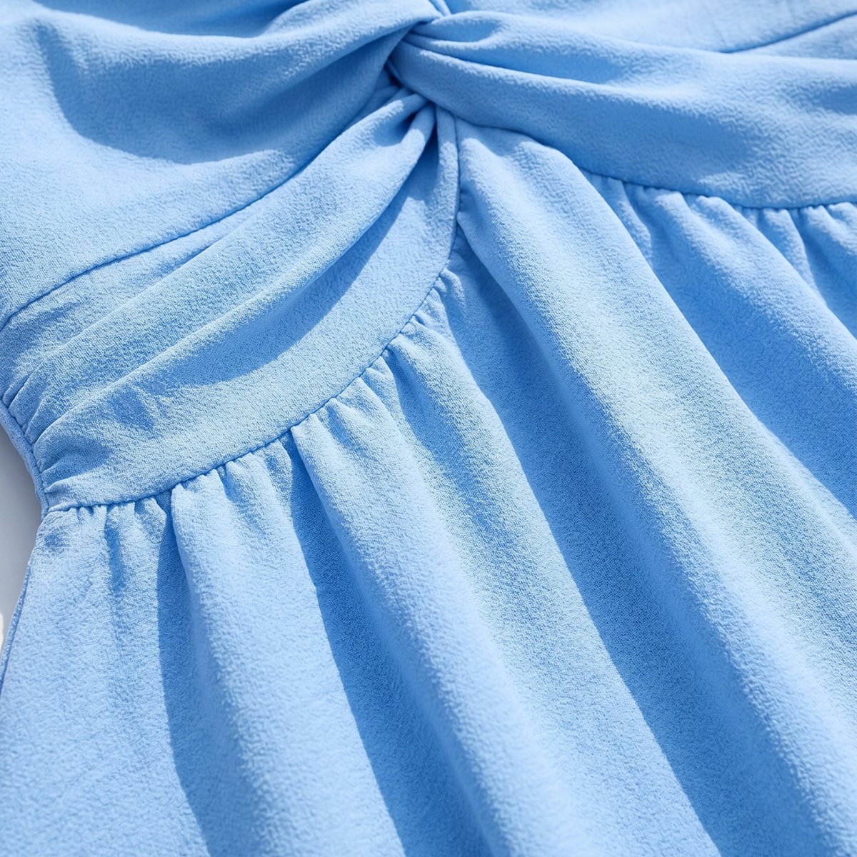 The Celeste Flutter Mini Dress